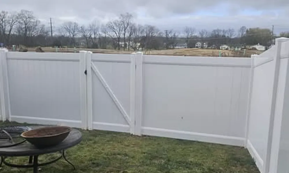 security-fence-installation-in-winchester-white-fence-and-grassy-area